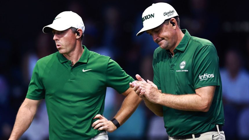 Rory McIlroy (left) of Boston Common Golf reacts during the team's final match of the regular season.