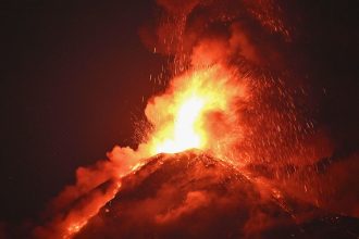 Guatemala's Volcano of Fire erupts Monday, as seen from Alotenango, Sacatepequez department, southwest Guatemala City,