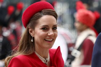 Catherine, Princess of Wales, smiles as she arrives to attend the annual Commonwealth Day service at Westminster Abbey in London.