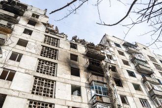 Damage is seen to a residential building hit in a Russian bombing attack in Kostiantynivka, an industrial city in Ukraine's Donetsk region, on March 13, 2025.