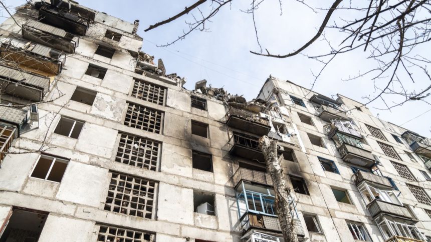 Damage is seen to a residential building hit in a Russian bombing attack in Kostiantynivka, an industrial city in Ukraine's Donetsk region, on March 13, 2025.