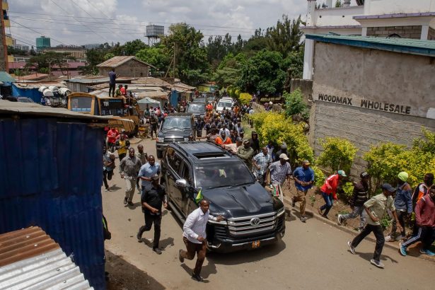 Presidential escort motorcade arrives in Kibera Slum during Kenyan President William Ruto's visit on March 13, 2025 in Nairobi, Kenya.