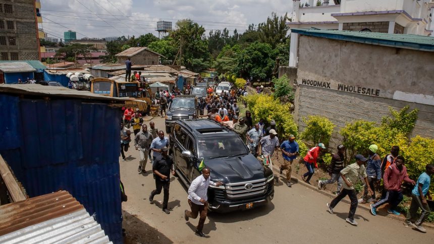 Presidential escort motorcade arrives in Kibera Slum during Kenyan President William Ruto's visit on March 13, 2025 in Nairobi, Kenya.