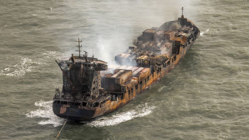 Smoke rises from the Solong cargo ship in the North Sea on Tuesday.