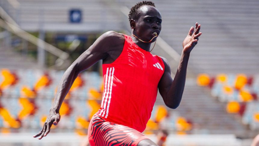 Gout Gout competes in the men's under-20 200m heats at the Queensland State Championships in Brisbane.