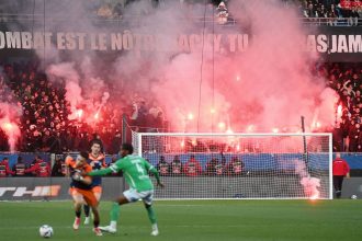 Montpellier supporters light flares during the match against Saint-Étienne at the Stade de la Mosson on Sunday.