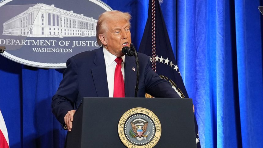 President Donald Trump speaks at the Justice Department on Friday.