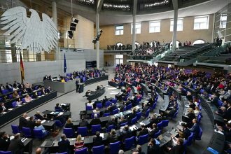 Friedrich Merz, leader of Germany's Christian Democratic Union, speaks during a session of the lower house of parliament on March 18, 2025, in Berlin.