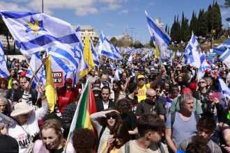 Israelis demonstrate against Prime Minister Benjamin Netanyahu in Jerusalem on Wednesday.