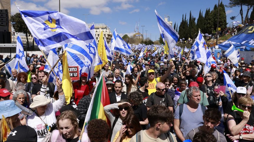 Israelis demonstrate against Prime Minister Benjamin Netanyahu in Jerusalem on Wednesday.