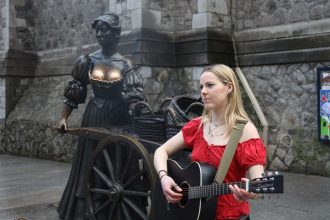 Busker Tilly Cripwell wants passersby to keep their mitts off Molly Malone.