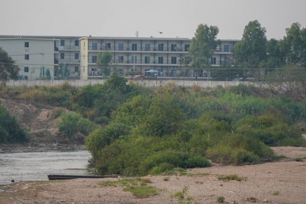 Scam compound buildings in Myanmar can be seen in this picture taken from Mae Sot, Thailand, in February 2025.