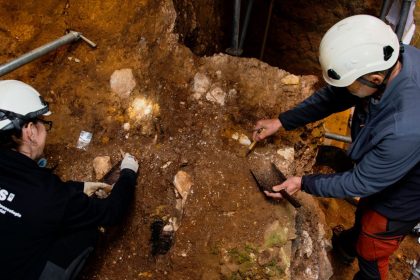 Archaeologists excavate near the cave at the Sima del Elefante site, near Burgos in northern Spain, where the fossilized skull fragments were found.