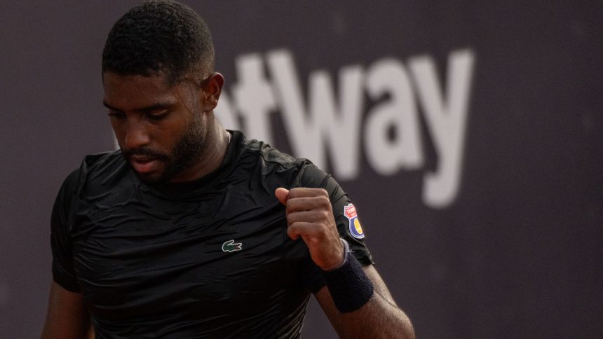 Reis da Silva celebrates a point while playing in Rio Open qualifying on February 17.