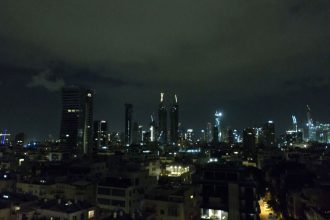 The skyline of Tel Aviv, Israel, early in the morning on Thursday, March 20, 2025, as sirens sound as Israel intercepted a missile launched by Yemen’s Houthi rebels.