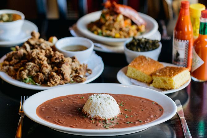 1. New Orleans: The Big Easy is the best place in the world to eat right now, according to Time Out. Pictured: Red beans and rice, cornbread and other dishes at The Praline Connection.