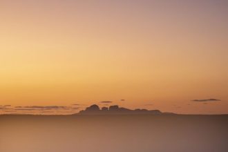 Over the course of two four-month road trips, Lisa Michele Burns drove across Australia and documented its varied landscapes in her new photo book, “Sightlines.” The collection highlights the patterns and palettes of her homeland — like this photo of In the middle of Australia's "Red Center," at the 1,325-square-kilometer (511-square-mile) Uluṟu-Kata Tjuṯa National Park. Look through the gallery to see more jaw-dropping photos of Australia, from east to west.