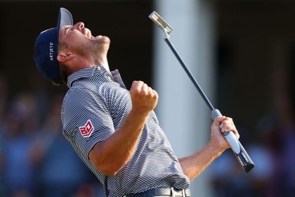 Bryson DeChambeau of the United States reacts to his winning putt on the 18th green during the final round of the 124th U.S. Open.