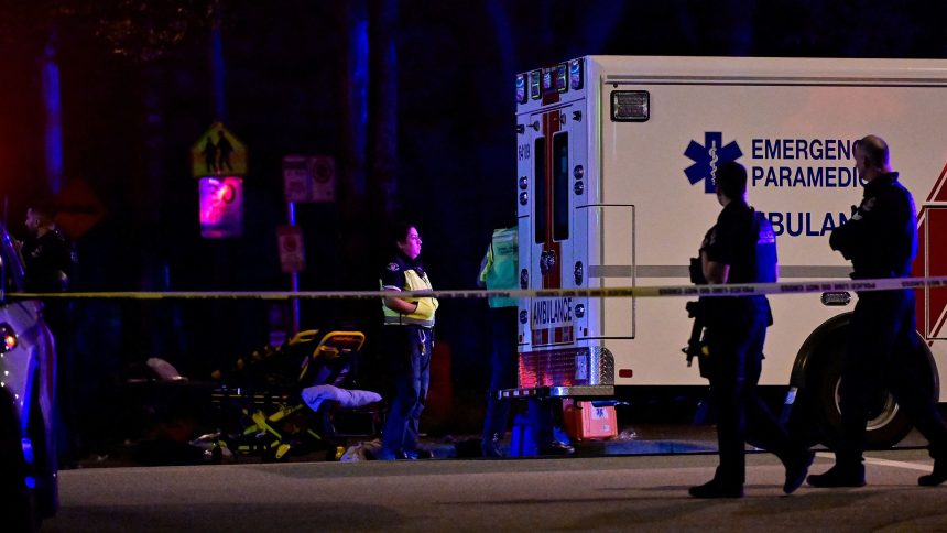 An ambulance is parked at the site of a street festival celebrating Filipino heritage in Vancouver, British Columbia, Canada, where a vehicle drove into a crowd on Saturday.
