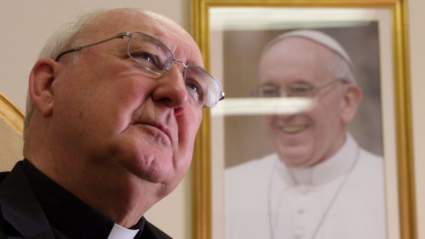 FILE - Cardinal Kevin Farrell, head of the Vatican's family and laity office, talks during an interview with The Associated Press in office in Rome, Tuesday, July 31, 2018. (AP Photo/Paolo Santalucia, file)