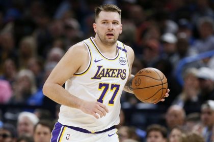 Los Angeles Lakers guard Luka Doncic handles the ball during the first half of an NBA basketball game against the Oklahoma City Thunder, Sunday, April 6, 2025, in Oklahoma City. (AP Photo/Nate Billings)