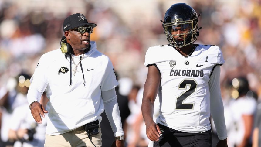 Shedeur Sanders along with his coach and father, Pro Football Hall of Famer Deion Sanders.