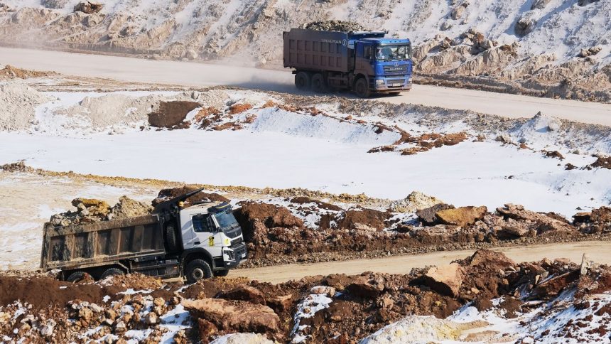 Earth and minerals are loaded onto trucks at an open-pit mine near the frontline on February 26, 2025 in Donetsk Region, Ukraine.