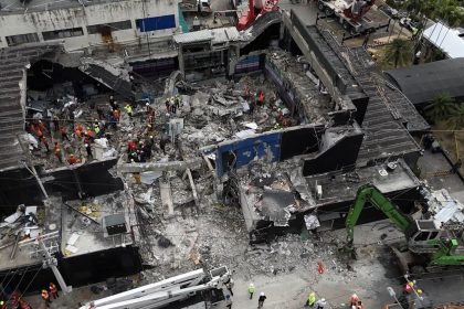 Aerial view shows rescue teams working at the Jet Set nightclub a day after the collapse of its roof in Santo Domingo on April 9, 2025.