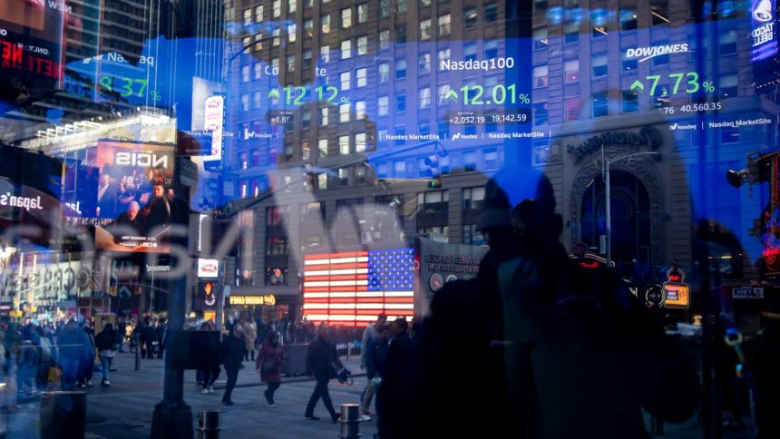 Stock market information at the Nasdaq MarketSite in New York on April 9, 2025.