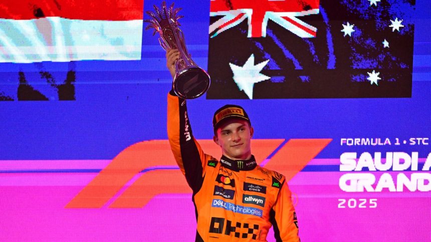 Oscar Piastri of the McLaren F1 Team celebrates on the podium during the 5th round of the Formula 1 World Championship in Jeddah, Saudi Arabia, on April 20, 2025.