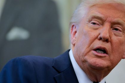 US President Donald Trump speaks to reporters in the Oval Office of the White House on April 22, 2025 in Washington, DC.