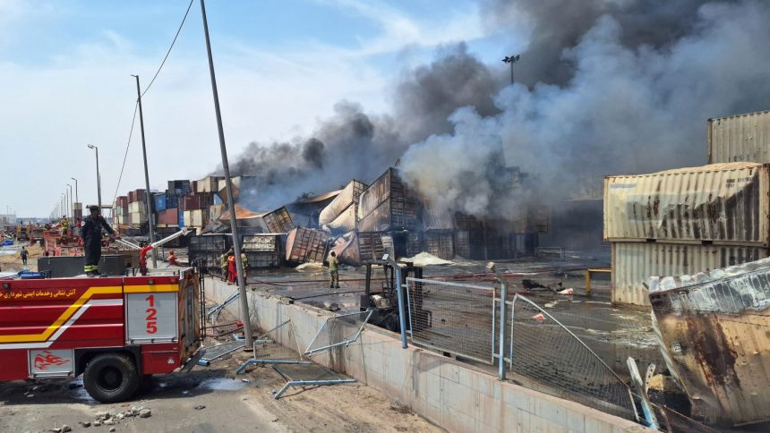 Heavy smoke rises at the scene of an explosion at the Shahid Rajaee port dock, southwest of Bandar Abbas.