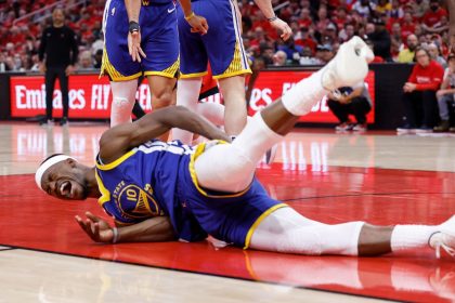 Jimmy Butler landed awkwardly after a collision with Amen Thompson.