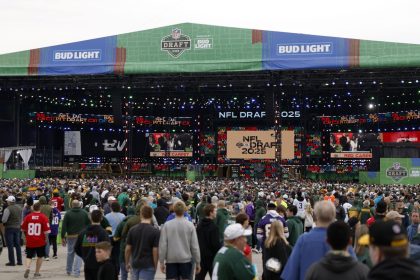 Fans gather at the NFL draft stage before the first round of the 2025 NFL draft at Lambeau Field on Thursday.