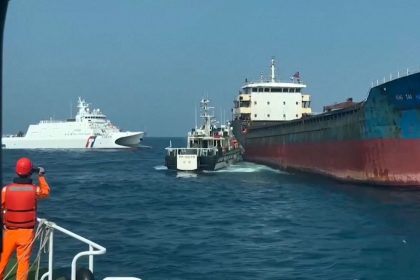 In this screengrab taken from a video, Taiwan Coast Guard vessels surround the Hong Tai 58 cargo ship on February 25, 2025.