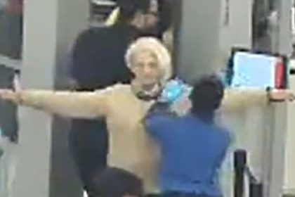 In this still from Port Authority of New York and New Jersey video obtained by CNN, Svetlana Dali gets patted down after going through a security checkpoint.