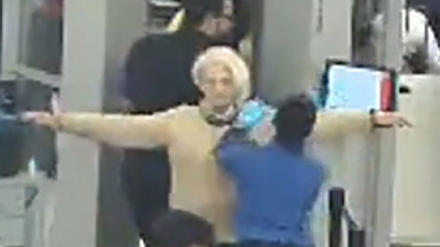 In this still from Port Authority of New York and New Jersey video obtained by CNN, Svetlana Dali gets patted down after going through a security checkpoint.
