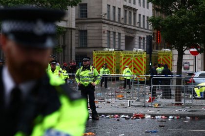 Soccer Football - Premier League - Liverpool Victory Parade - Liverpool, Britain - May 26, 2025
Emergency services at an incident involving a car and supporters during the Victory parade Action Images via Reuters/Lee Smith