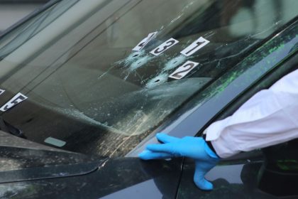 Crime scene investigators at the site where the personal secretary and an adviser to Mexico City's mayor were killed by gunmen on a motorcycle, in Mexico City, May 20, 2025.
