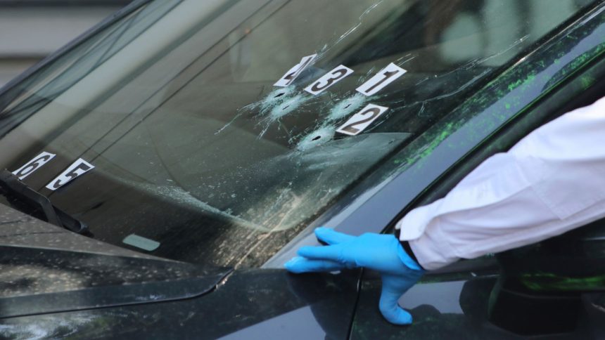 Crime scene investigators at the site where the personal secretary and an adviser to Mexico City's mayor were killed by gunmen on a motorcycle, in Mexico City, May 20, 2025.