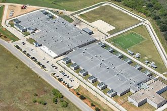 South Texas ICE Processing Center is seen in an undated photo from the Geo Group, the company that operates the site.