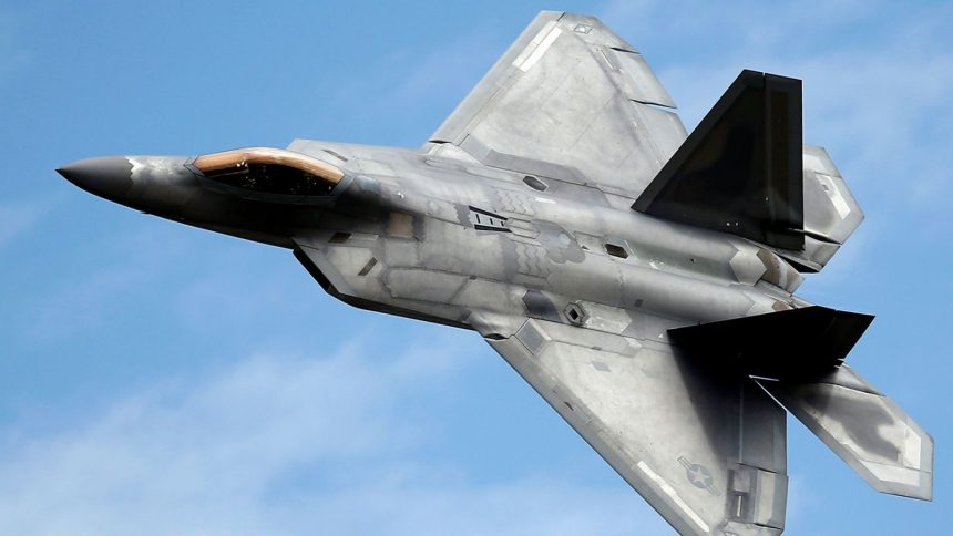 A Lockheed Martin F-22 Raptor fighter turns during a flying display at the Royal International Air Tattoo in Fairford, Britain, on July 8, 2016.