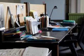 Desks sit empty inside the Grand Army of the Republic Building as employees worked remotely due to the Covid-19 pandemic in Detroit, Michigan on June 8, 2021.