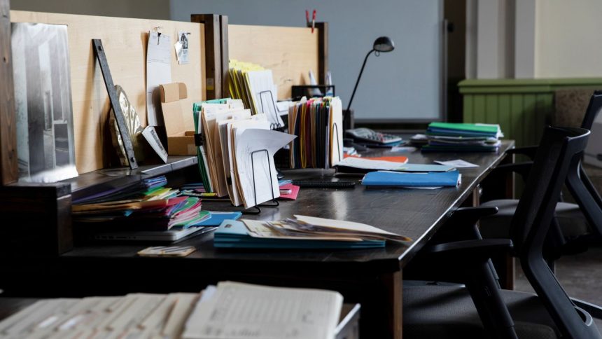 Desks sit empty inside the Grand Army of the Republic Building as employees worked remotely due to the Covid-19 pandemic in Detroit, Michigan on June 8, 2021.