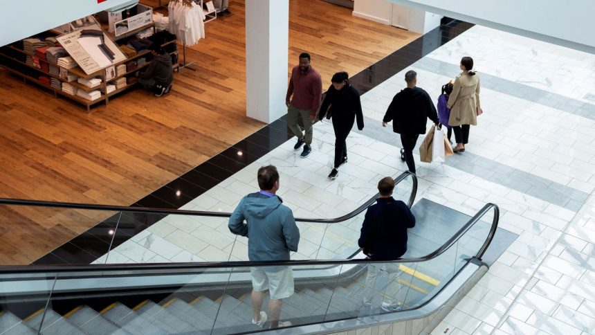 Shoppers walk through the King of Prussia Mall in Pennsylvania.