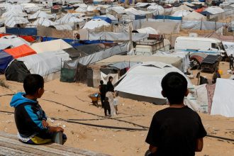 Palestinians, displaced by the Israeli military offensive, shelter in a tent camp in Khan Younis, southern Gaza Strip, April 6, 2025.