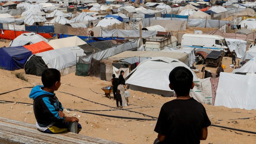 Palestinians, displaced by the Israeli military offensive, shelter in a tent camp in Khan Younis, southern Gaza Strip, April 6, 2025.