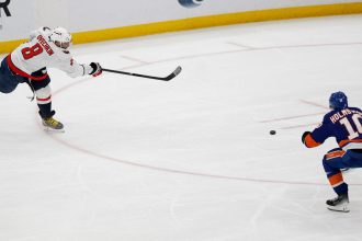 Washington Capitals left wing Alex Ovechkin scores a goal in the second period against the New York Islanders at UBS Arena. The goal was the 895th of Ovechkin’s career, breaking the NHL all-time career goals record.