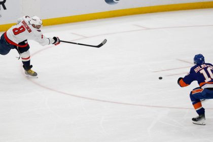 Washington Capitals left wing Alex Ovechkin scores a goal in the second period against the New York Islanders at UBS Arena. The goal was the 895th of Ovechkin’s career, breaking the NHL all-time career goals record.
