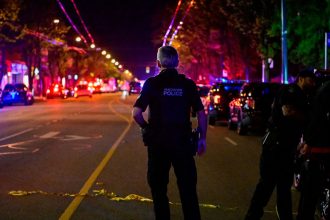 Police work on Fraser street, near the site of the Lapu Lapu day block party where a vehicle drove into a crowd killing several people in Vancouver, British Columbia, Canada April 26, 2025. REUTERS/Jennifer Gauthier